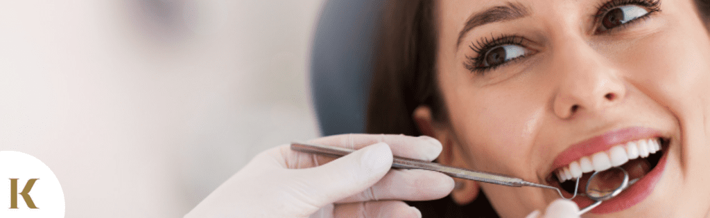 woman seeking the help of emergency dentist in St Helens