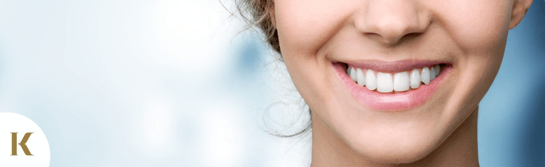 woman smiling after seeing emergency dentist in st helens